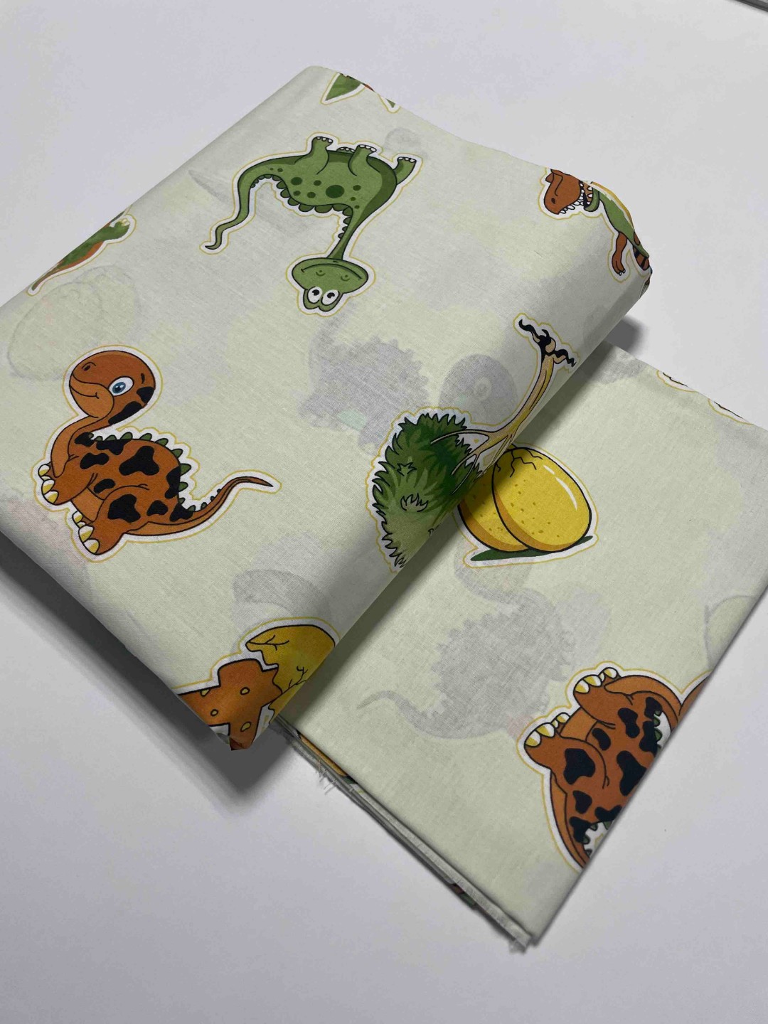 Ранфорс Різнокольорові динозаврики на ванільному фоні